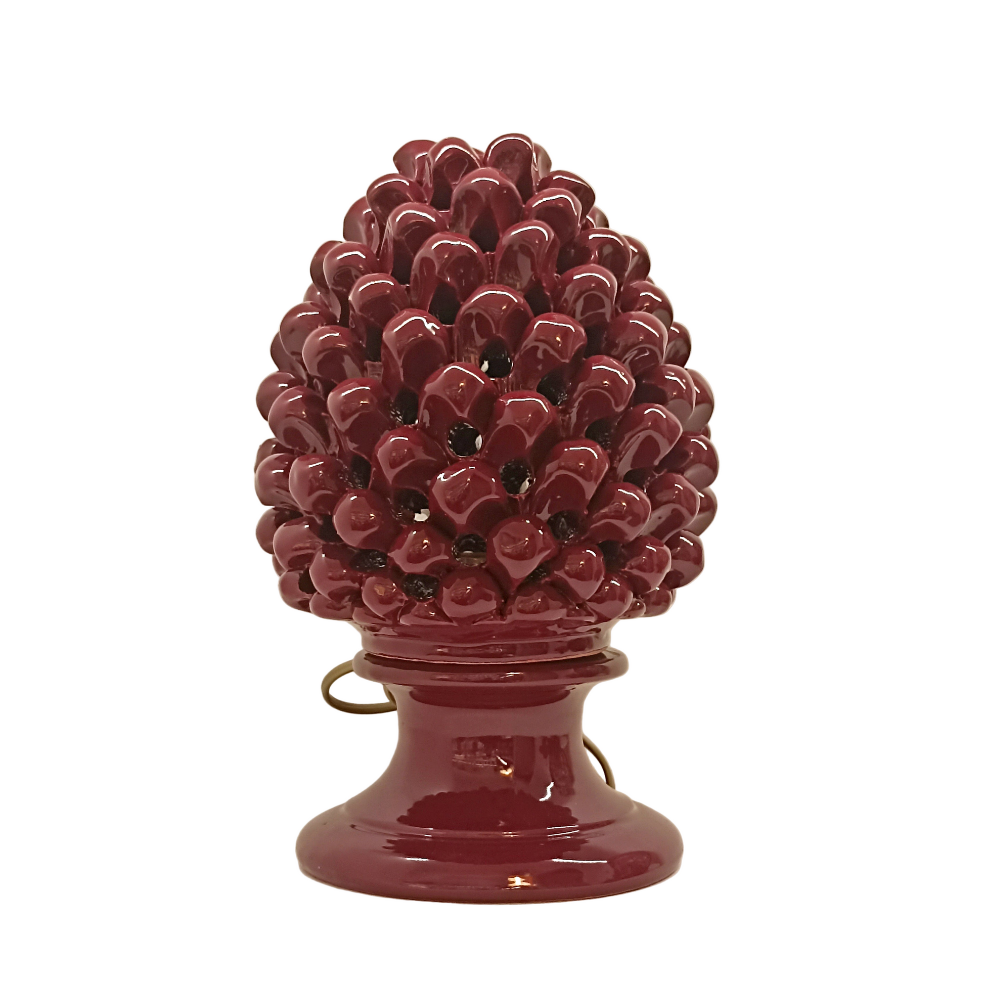 Pigna traforata con lampadina interna di Caltagirone 