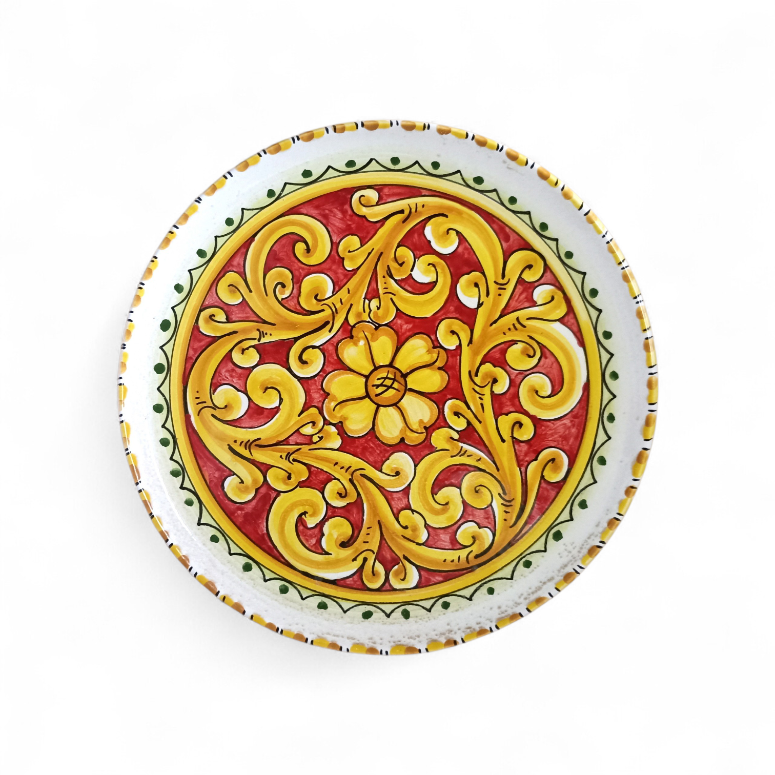 piatto decorato in maiolica di caltagirone