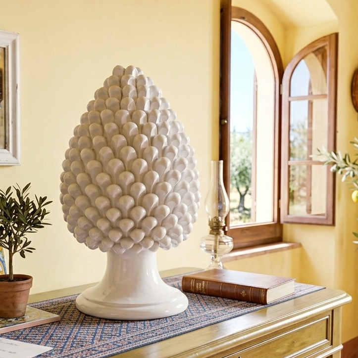 white handmade ceramic pinecone